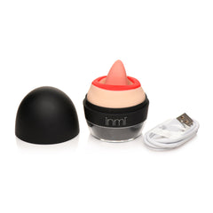 Lady Licker disassembled showing black protective cap, stimulator unit, and included USB charging cable