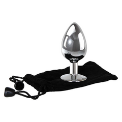 Large metal anal plug shown beside black velvet storage pouch, angled side view