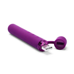 Le Wand Baton with USB charging port open, attached cap on tether ring
