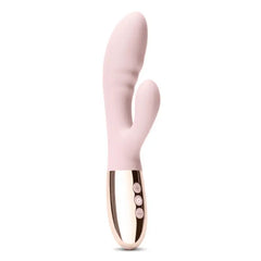 Le Wand Blend pink silicone rabbit vibrator showing dual-stimulation design and three control buttons