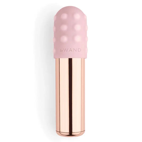 Le Wand Bullet vibrator in rose gold with blush pink textured silicone sleeve