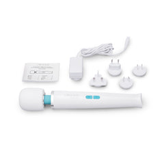 Le Wand Classique wand massager with charging adapter, four plug adapters, and user guide