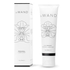 Le Wand Coconut Love Oil tube beside its minimal white box, personal lubricant 90ml
