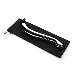 Le Wand Contour silver wand resting on black drawstring storage pouch included