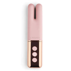 Le Wand Deux blush pink silicone dual-tip vibrator with three rose gold control buttons, front view