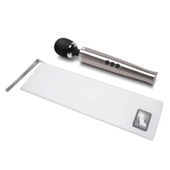 Le Wand Die Cast Massager beside included white zippered storage pouch with logo