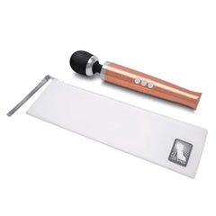Le Wand Die Cast Massager displayed beside its included white zippered storage pouch