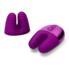 Le Wand Double Vibe with removable ribbed silicone attachment cap displayed beside the main device