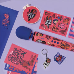 Le Wand Feel My Power wand vibrator displayed with full kit contents on lavender flat-lay surface