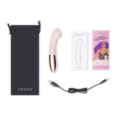 Le Wand Gee unboxed with satin storage pouch, charging cable, and guide booklets