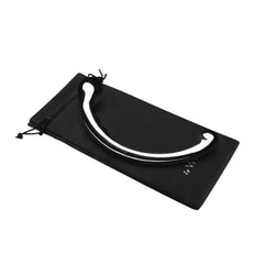 Le Wand Hoop stainless steel wand resting on its included black drawstring storage pouch
