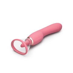 Le Wand Lick laid horizontally showing suction cup end and gold accent ring detail