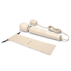 Le Wand massager with cord, adapter, and included cream fabric storage pouch
