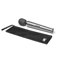 Le Wand massager resting beside included black zippered storage travel pouch with branded pull tab