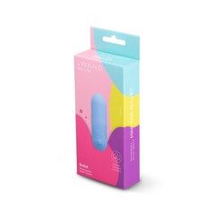 Le Wand Mini Vibe Bullet beside its colorful retail box for packaging scale reference