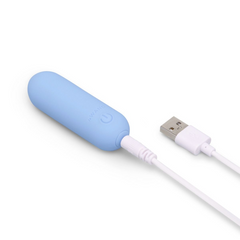 Le Wand Mini Vibe Bullet connected to USB charging cable, rechargeable design