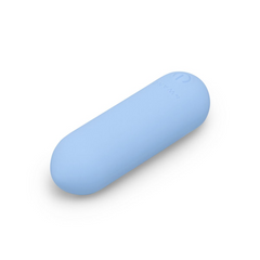 Le Wand Mini Vibe Bullet lying flat, showing rounded capsule silhouette from above