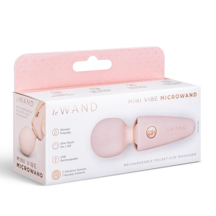 Le Wand Mini Vibe Microwand in blush pink with rose gold accents shown in retail box