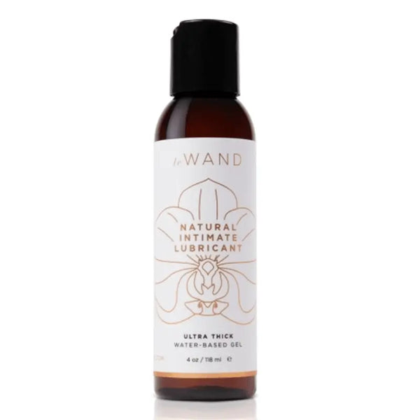 Le Wand Natural Intimate Lubricant in a 4 oz amber bottle with black flip-top cap