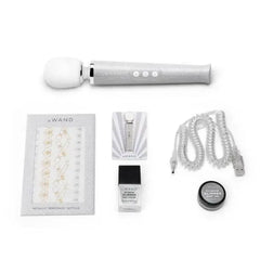 Le Wand Petite All That Glimmers complete set contents laid flat including massager and extras