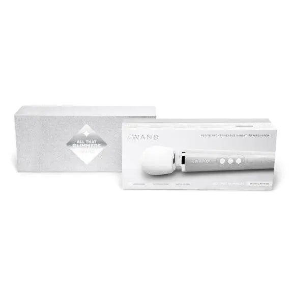 Le Wand Petite All That Glimmers Special Edition packaging box beside the wand massager
