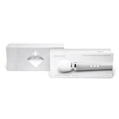 Le Wand Petite All That Glimmers Special Edition packaging box beside the wand massager
