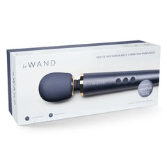Le Wand Petite navy massager in open retail box labeled Petite Rechargeable Vibrating Massager