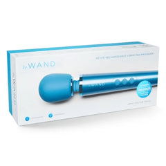 Le Wand Petite Vibrating Massager in retail box labeled petite rechargeable vibrating massager