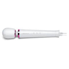 Le Wand Powerful Petite Plug-In Massager in white with pink accent ring and power cord