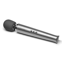 Le Wand Rechargeable Massager shown at an angle highlighting the brushed silver handle and round silicone head