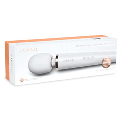 Le Wand Rechargeable Vibrating Massager white packaging box with rose gold branding details