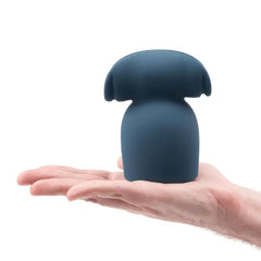 Le Wand Stroke blue silicone attachment resting in an open palm to show compact size