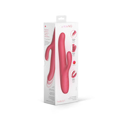 Le Wand Thrust rabbit vibrator beside its white retail packaging box, side angle
