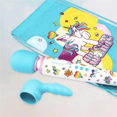 Le Wand Unicorn Wand massager and teal attachment displayed beside the illustrated drawstring storage bag