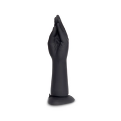 Left-side view of b-Vibe fisting dildo displaying smooth matte silicone finish and hand detail