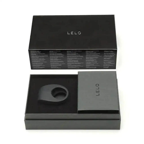 Lelo Tor 2 vibrating cock ring in black silicone displayed in open luxury gift box with booklet