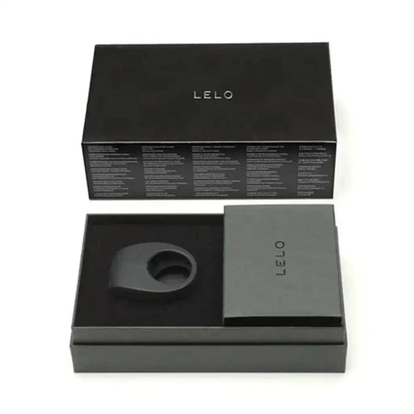 Lelo Tor 2 vibrating cock ring in black silicone displayed in open luxury gift box with booklet