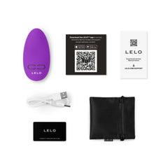 LELO NEA Originals unboxed showing massager, USB cable, storage pouch, and app card
