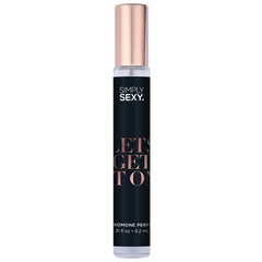 Close-up of Let's Get It On travel-size spray bottle showing black label and rose-gold atomizer tip