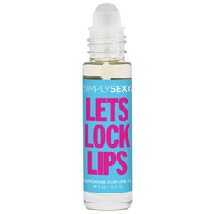 Close-up of Let's Lock Lips roll-on perfume oil bottle showing clear glass and ball applicator