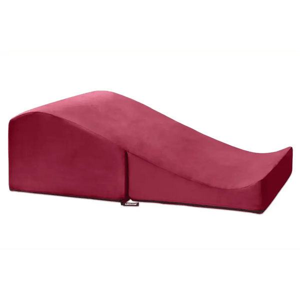 Liberator Flip Ramp positioning pillow in merlot microfiber with curved wedge silhouette