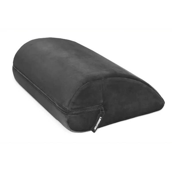 Liberator Jaz Motion positioning pillow in black with half-cylinder foam shape and zip cover