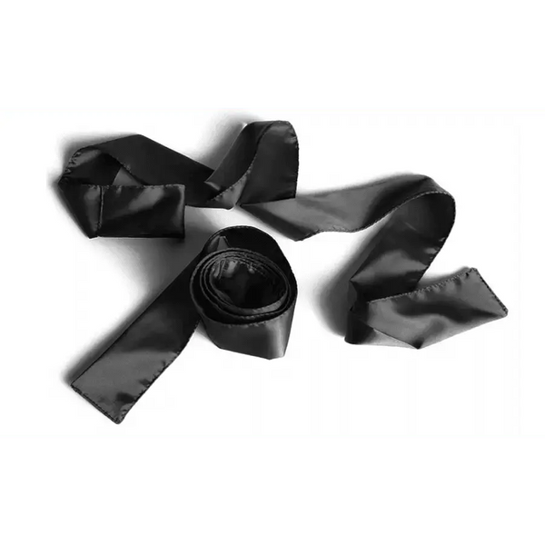 Liberator Silky Tie Ups coiled black satin ribbon with flowing ends on white