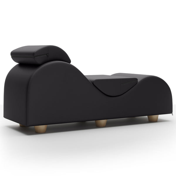 Liberator Esse II black faux leather relaxation chaise showing contoured back and detachable headrest