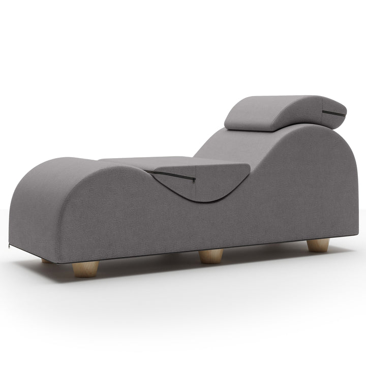 Liberator Esse II chaise lounge in iron grey fabric, front angle showing curved ergonomic silhouette and headrest