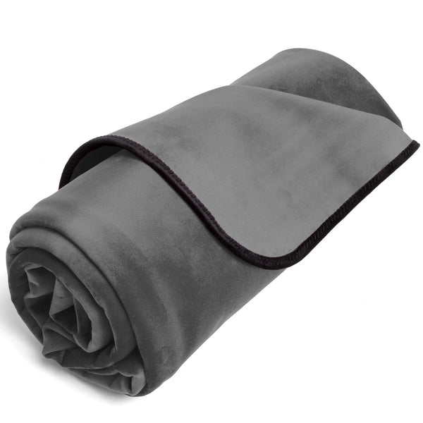 Liberator Fascinator Lush Throw King rolled up, showing grey microvelvet top and dark binding edge