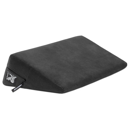 Liberator Wedge Décor positioning cushion in black velvet with zipper, angled wedge shape