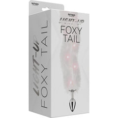 Light Up Foxy Tail packaging showing white fluffy tail and silver metal plug base