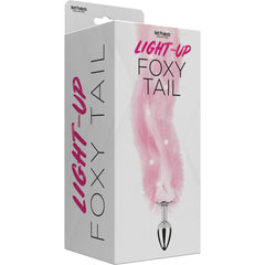 Light Up Foxy Tail retail box showing pink fluffy tail and silver plug product details