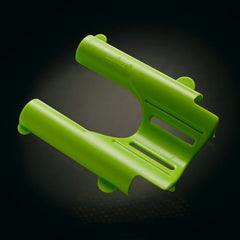 Lime-green comfort base cradle with dual tube openings and ventilation slots